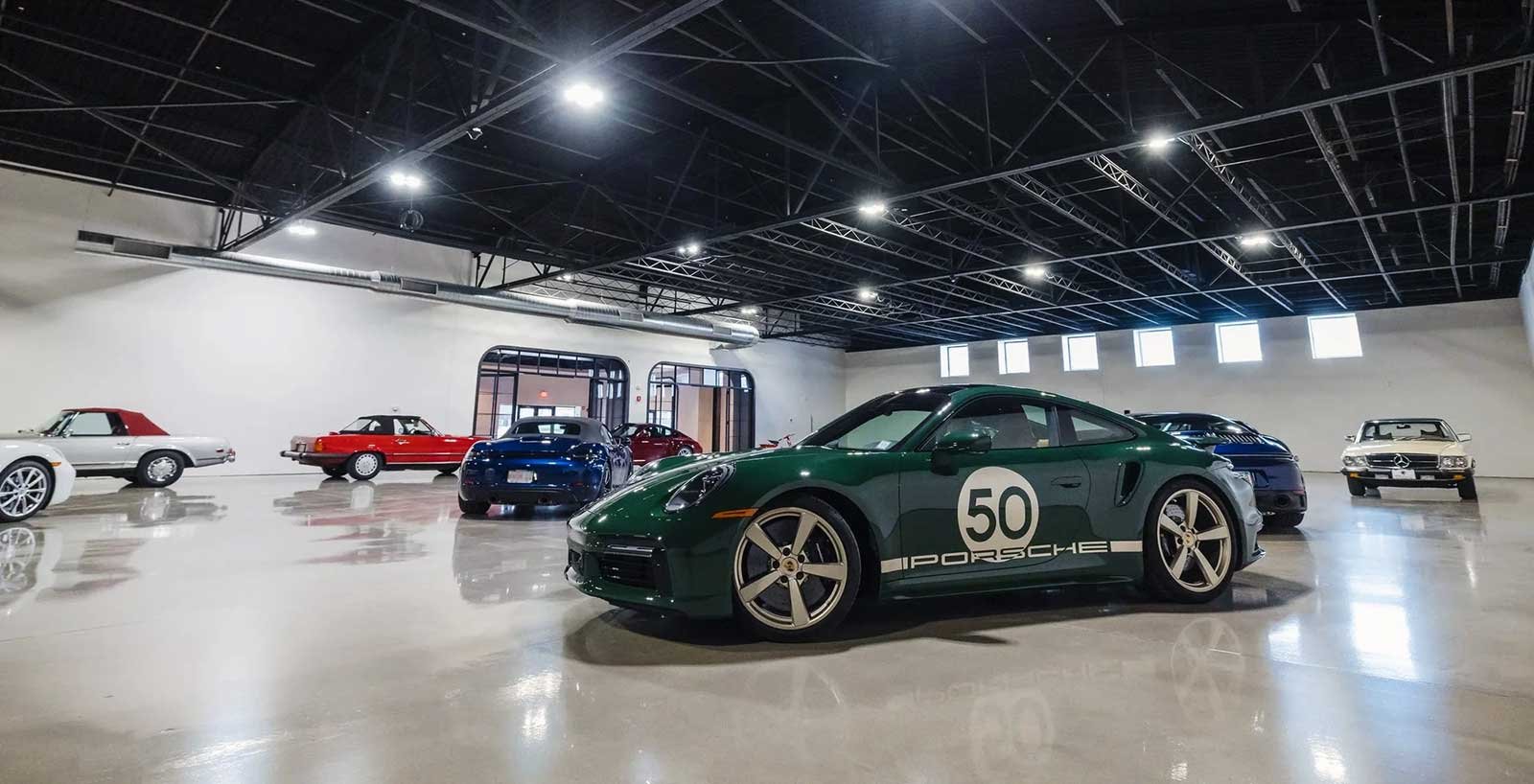 The Archive Motor Club's showroom, featuring a Resinwerks floor with a contemporary, clear flood finish.