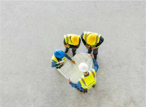 Photo of architects planning the resinous floor coating design for a project.